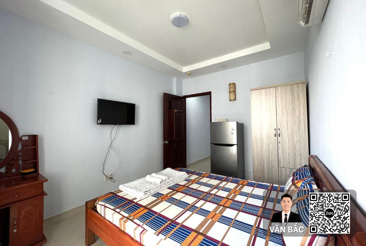 khach-san-mat-tien-245a-bui-van-ba-q7-dt-5x25m-6-tang-co-16p-hdt-50tr-thang-gia-26-5-tỷ (3)